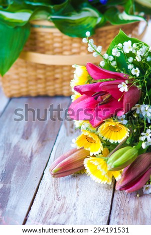 Flowers on the table and flowers basket