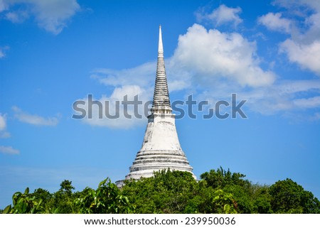 Temple thai on mount against blue sky background