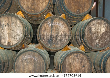 Sant Sadurni d\'Anoia, Spain - February 23, 2014: Old Wine barrels in the Codorniu winery. Codorniu winery is located in Sant Sadurni d\'Anoia near Barcelona, Spain.