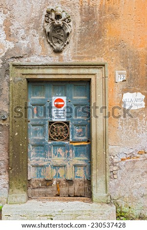 Rome, Italy - September 18, 2014: Old entrance doors to the Villa Appia delle Sirene in Rome, Italy.