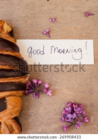 Croissant with good morning note and lilac