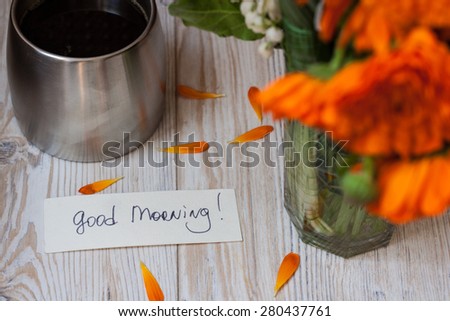 coffee orange flower and good morning note