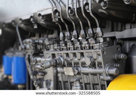 Engine details in perspective. Diesel engine. Motor truck background