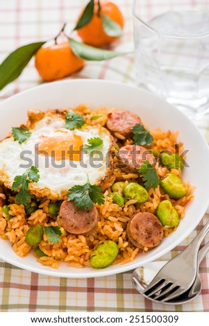 Ketchup Fried Rice with Sausage, Board Beans Topped with Sunny Side Up Egg