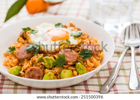 Ketchup Fried Rice with Sausage, Board Beans Topped with Sunny Side Up Egg