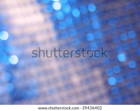 Abstract background with blue circles-patches of light.