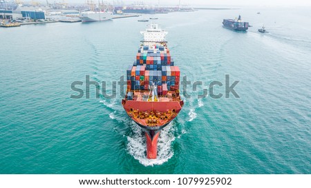 Aerial top view container cargo ship, Business import export logistic and transportation of International by container cargo ship in the open sea.