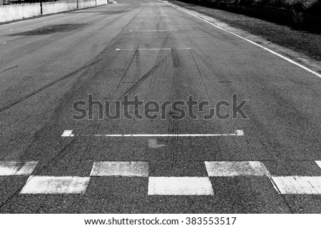 The painted start/finish line across the track