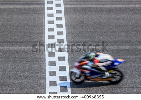 Super sport motorcycle crossing the finish line
