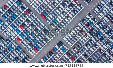 Top view of new cars lined up outside an automobile factory for import & Export.