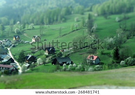 Polish village in the Beskid Mountains. Tilt-shift landscape