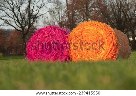 Two straw bales made from plastic drinking straws.