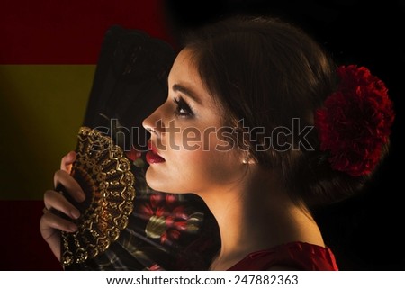 Female flamenco dancer with Spanish flag.