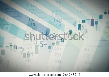 Financial data on PC screen. Data analyzing. Multiple exposure shot of PC screen financial report, stock chart and spreadsheet table.