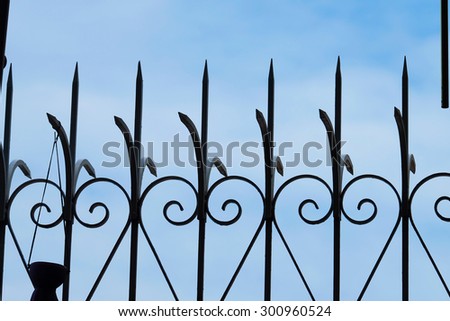 Wrought iron fence, silhouette picture