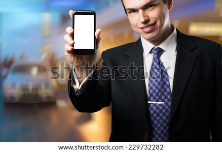 Business man presenting mobile application with copy space on screen