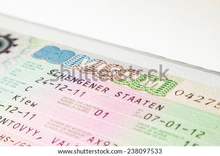 German Schengen visa in travel passport closeup