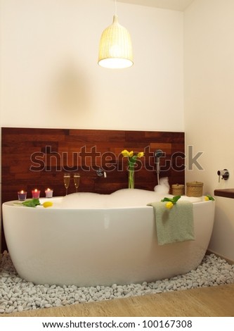 Hot relaxing bath with floral aroma and foam