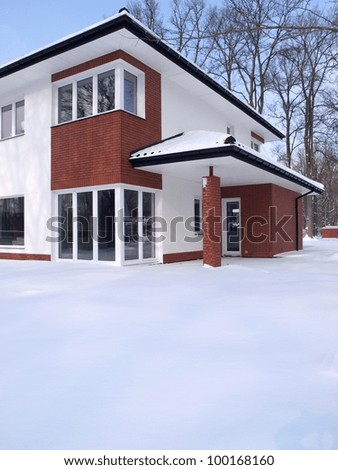 Beautiful modern house in outdoor perspective in winter