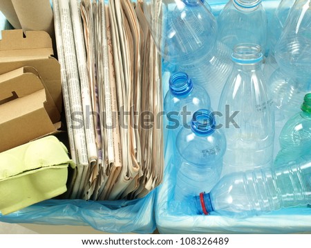 Closeup of segregated plastic and paper waste