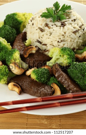 Rice, beef meat, broccoli and cashews- chinese meal