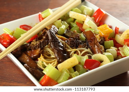Bowl of chinese meal with noodles and veggies
