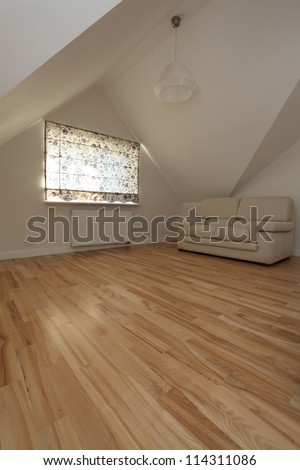Bright living room on the attic of modern house