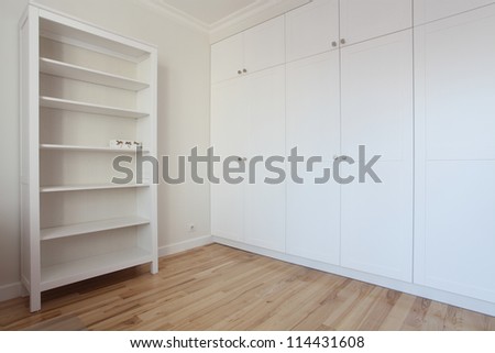 Modern room with shelf and white wardrobe - removal