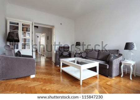 White living room with a purple furniture