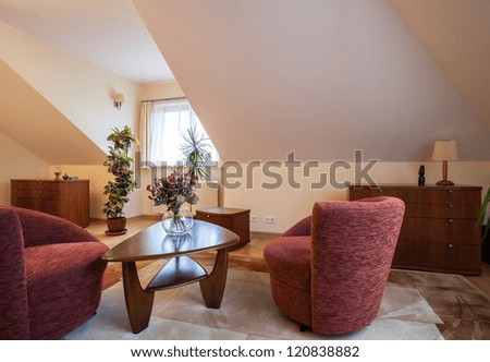 Soft and comfortable armchairs in living room