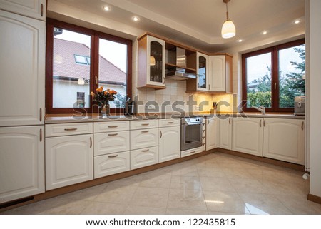 Horizontal view of the beige kitchen
