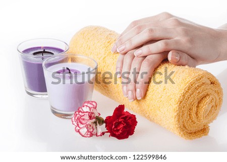 Neat hands on a rolled up towel