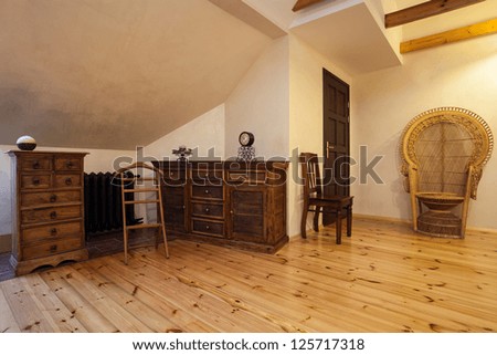 Cloudy home - wooden furniture- dresser and armchair