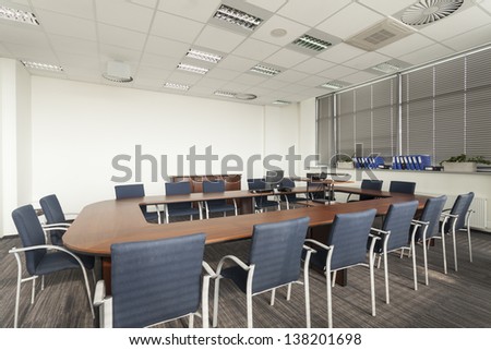 Empty conference room with huge round table