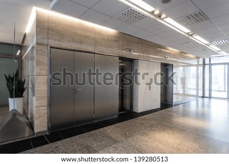 Modern interior of office, corridor and lift