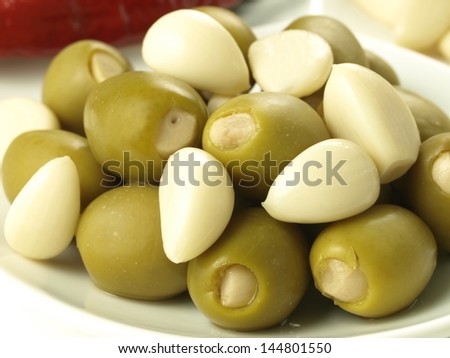 Green olives stuffed with garlic cloves, closeup