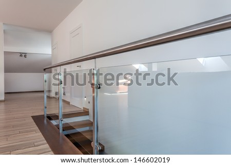 Bright space - stairs with a glass metal barrier