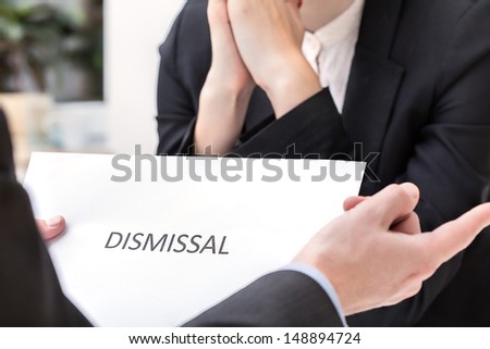 Business meeting and dismissal, people in suits