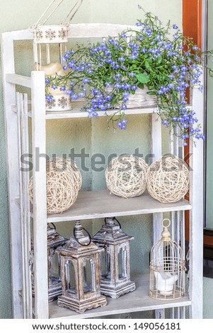 Mediterranean interior - artistic vintage shelves with stylish ornaments