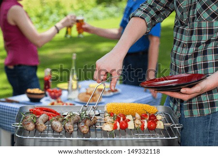A Summer Garden Party With Grilled Snacks And Drinks