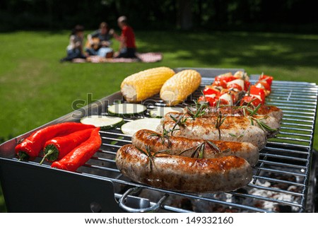 Summer Barbecue In The Garden With Yummy Food