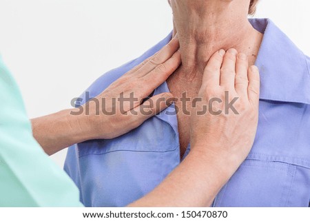 Problems with thyroid, nurse examining a patient