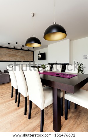 Urban Apartment - Closeup Of A Wooden Dining Table