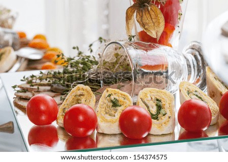 Fresh cherry tomatoes on a snack plate