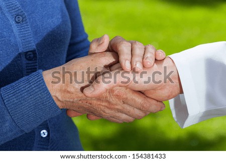Closeup of a handshake - doctor and a patient