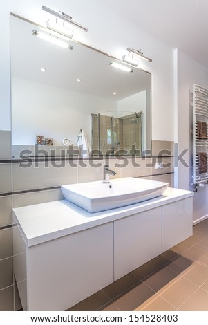 Bright Space - A White Modern Ladies Room With A Big Mirror