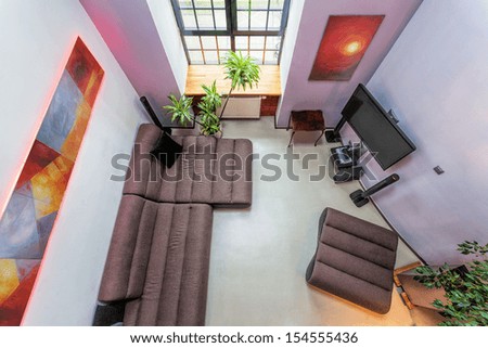 Bird eye view of a modern living room with abstract modern painting