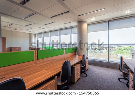 Modern Interior With Wooden And Green Office Furniture