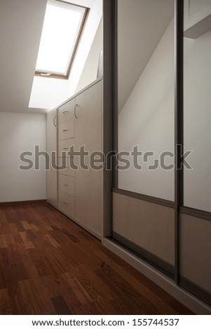 Modern house: room with wardrobe, vertical view
