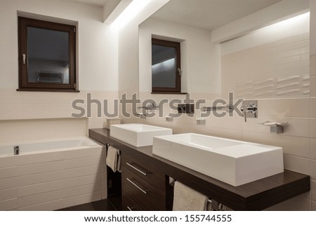 Travertine house - Stylish bathroom in cream color